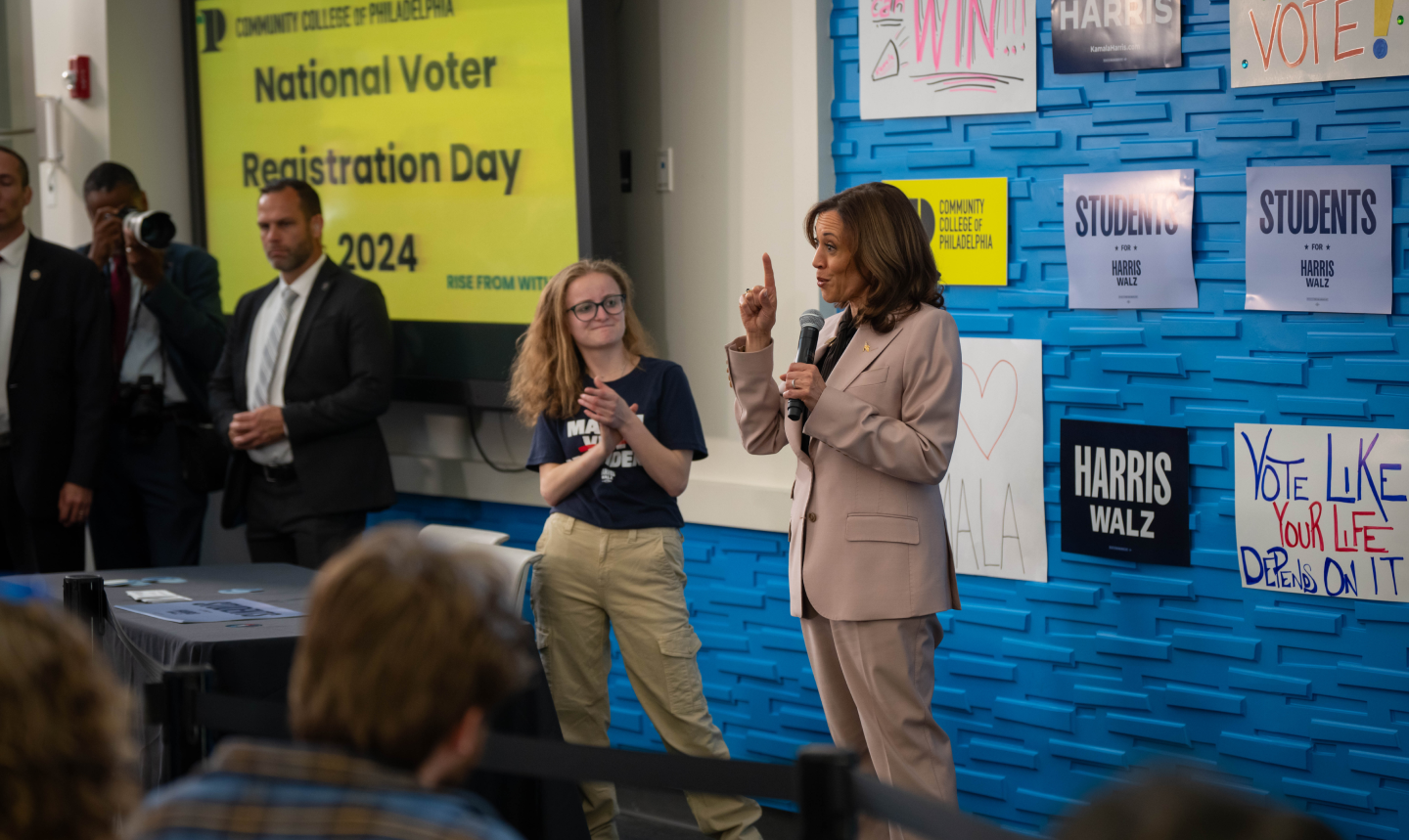 Kamala at a school bus